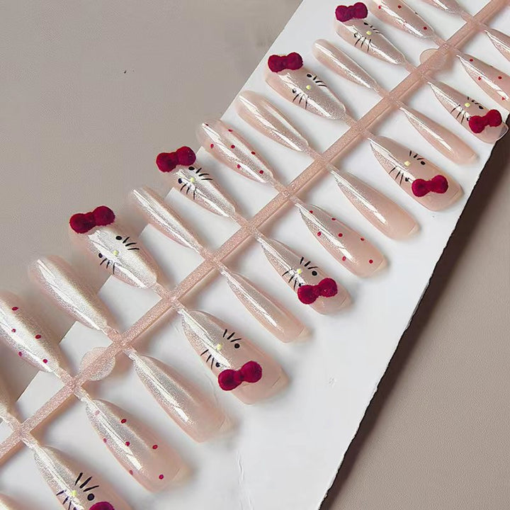 Artificial nails with playful Hello Kitty design Kalsten