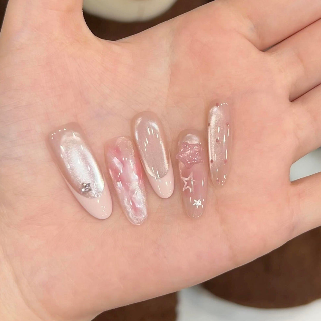 Artificial nails with delicate glitter and star motifs Kalsten