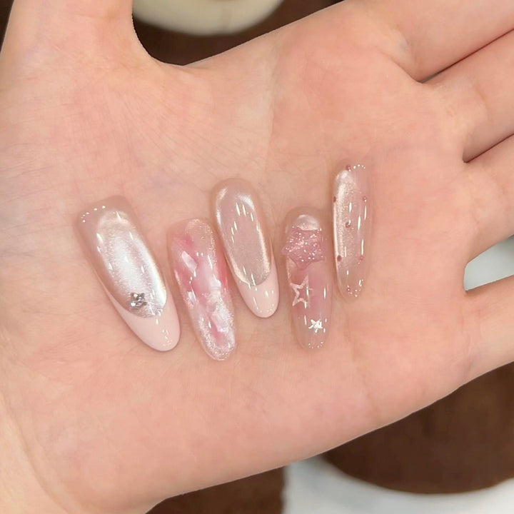Artificial nails with delicate glitter and star motifs Kalsten