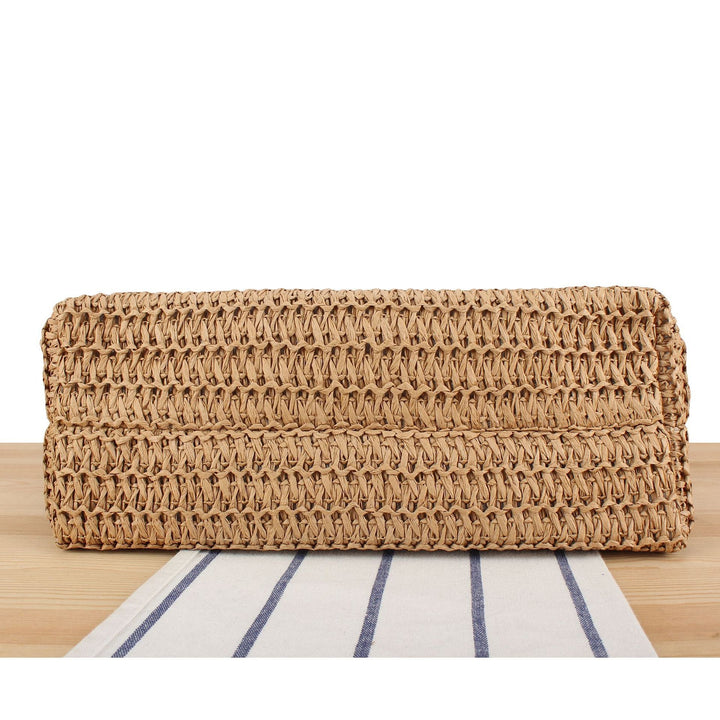 Beach bag made of handwoven natural material with fringe decoration Kalsten