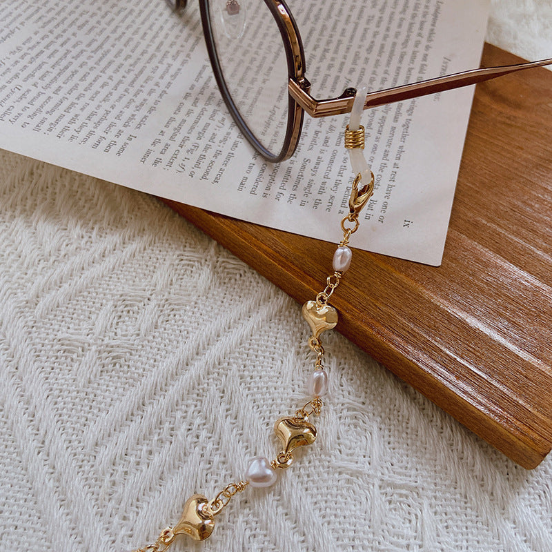 Fashionable necklace with pearls and golden accents Kalsten