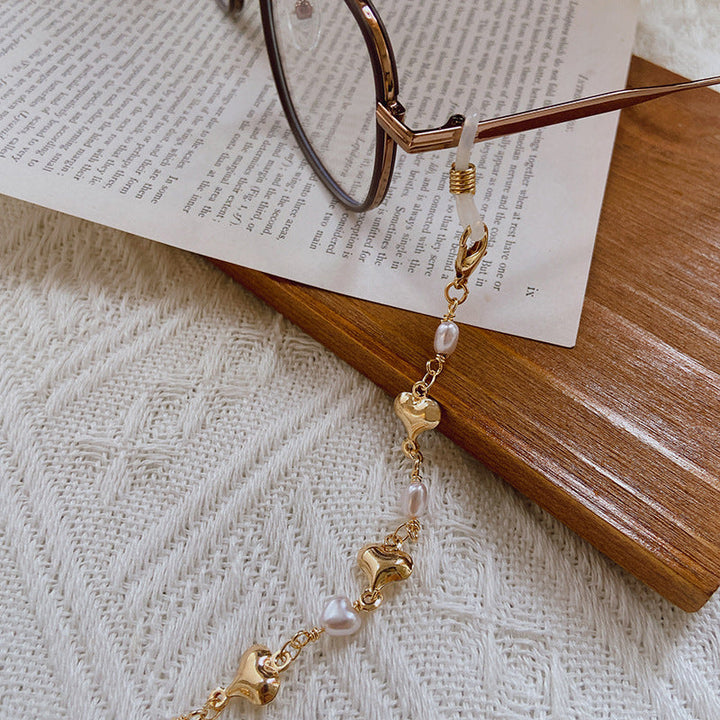 Fashionable necklace with pearls and golden accents Kalsten