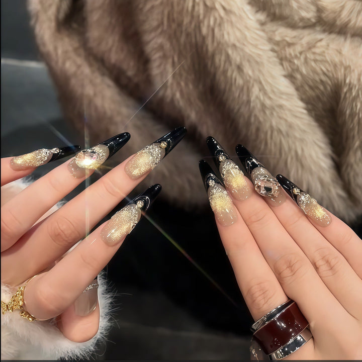 Glamorous artificial nails with extravagant rhinestone and glitter insets Kalsten