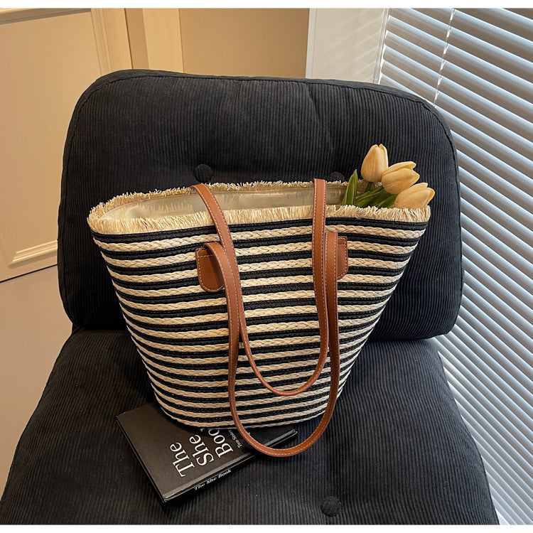 Generous beach bag with leather handles Kalsten