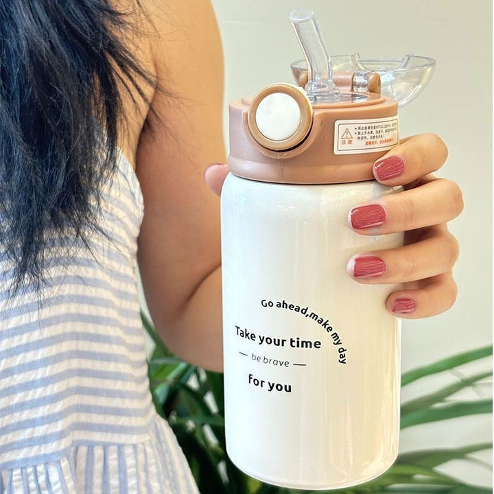 Women's insulated drinking bottle with innovative flip lid and practical handle Kalsten