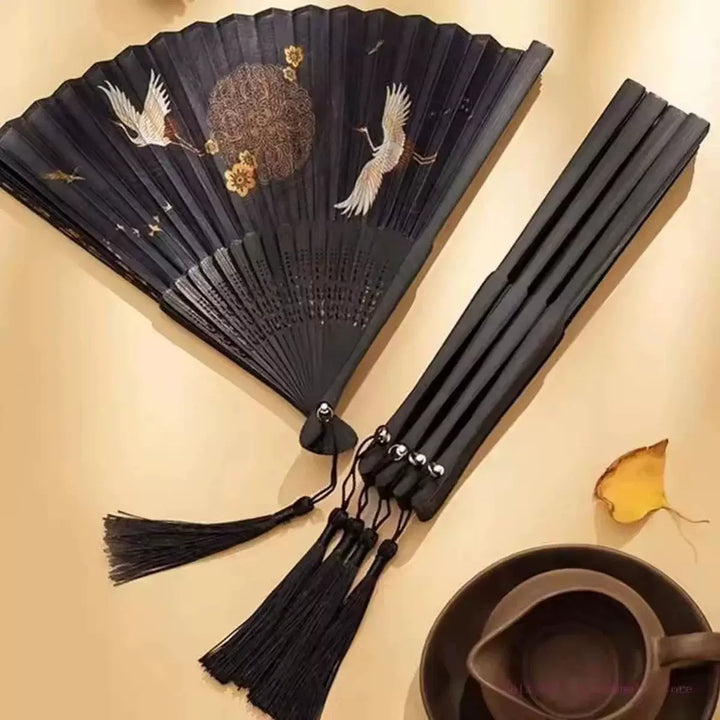 Ladies One Size hand-painted crane and plum blossom fan with carved wood ribs and silk tassel Kalsten