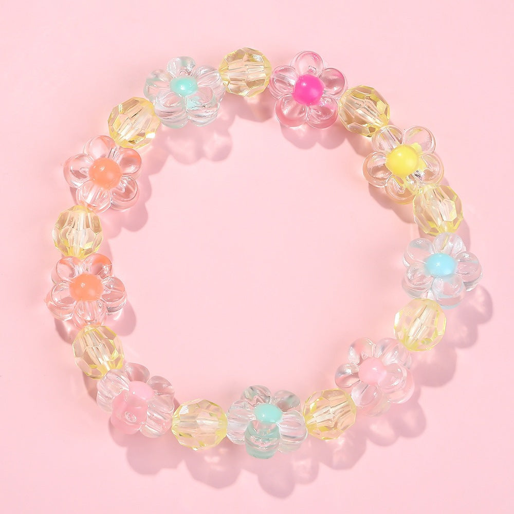 Friendship bracelet with colorful flower motifs Kalsten