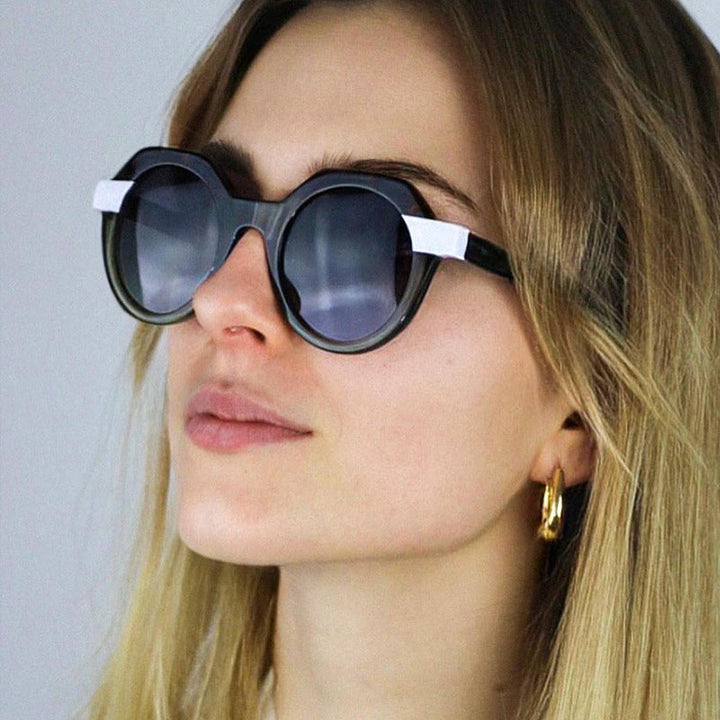 Ladies extravagant round sunglasses with colored accented frame Kalsten