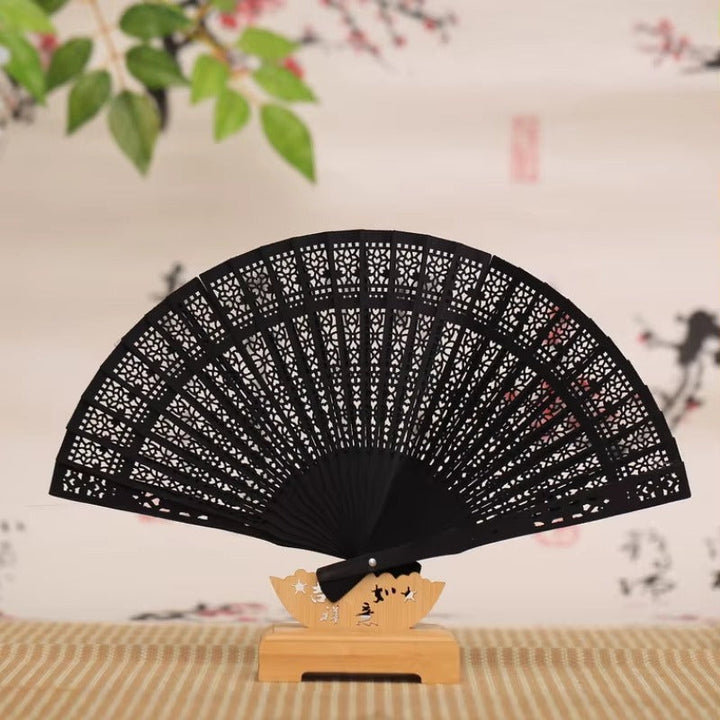 Ladies fine fan made of artistically pierced paper Kalsten