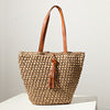 Handcrafted basket bag with fashionable tassel detail Kalsten