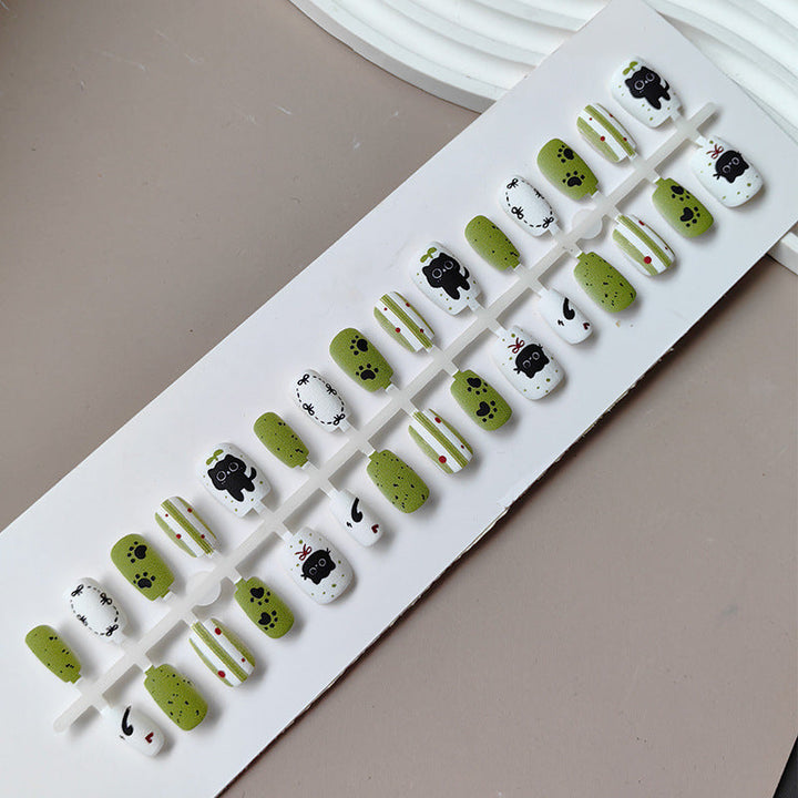 Creative art press-on nails with playful animal design Kalsten