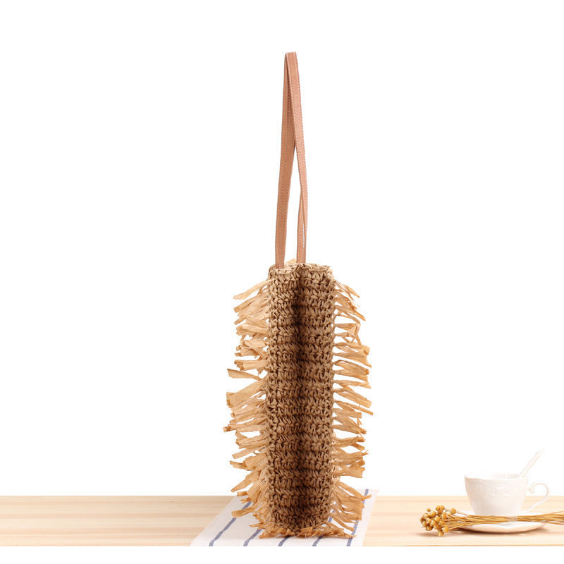 Beach bag with fringes and sturdy leather handles Kalsten