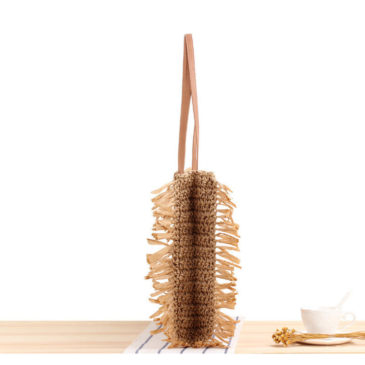 Beach bag with fringes and sturdy leather handles Kalsten