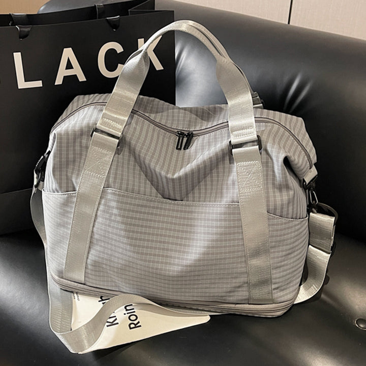 Sporty travel bag with practical storage and adjustable shoulder straps Kalsten
