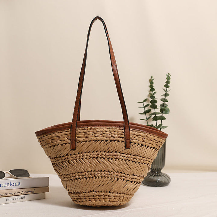 Braided basket bag with innovative leather handles Kalsten