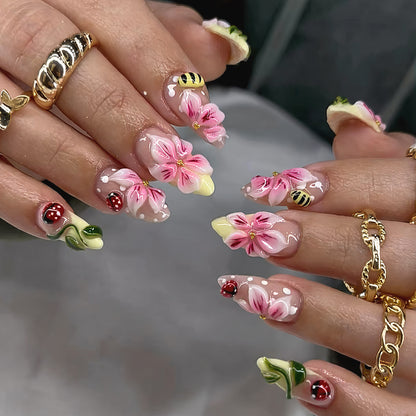 Artificial nail set with floral 3D applications and gloss finish Acalora