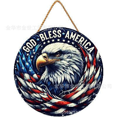 Independence Day rustic round wooden patriotic cross wall plaque with floral accents and God Bless America banner Kalsten