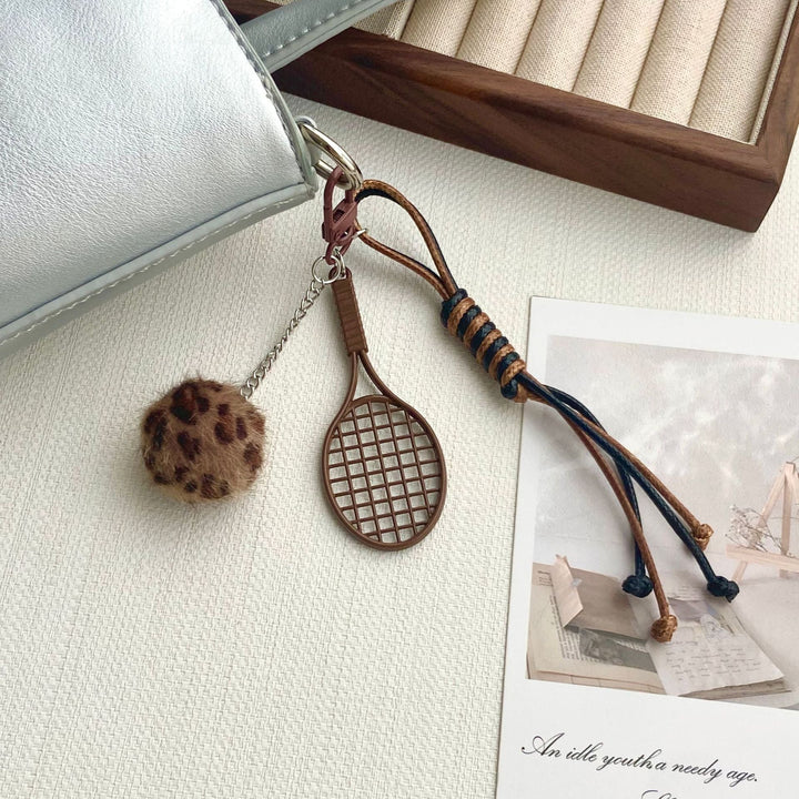 Tennis Racket and Fur Ball Keychain Kalsten