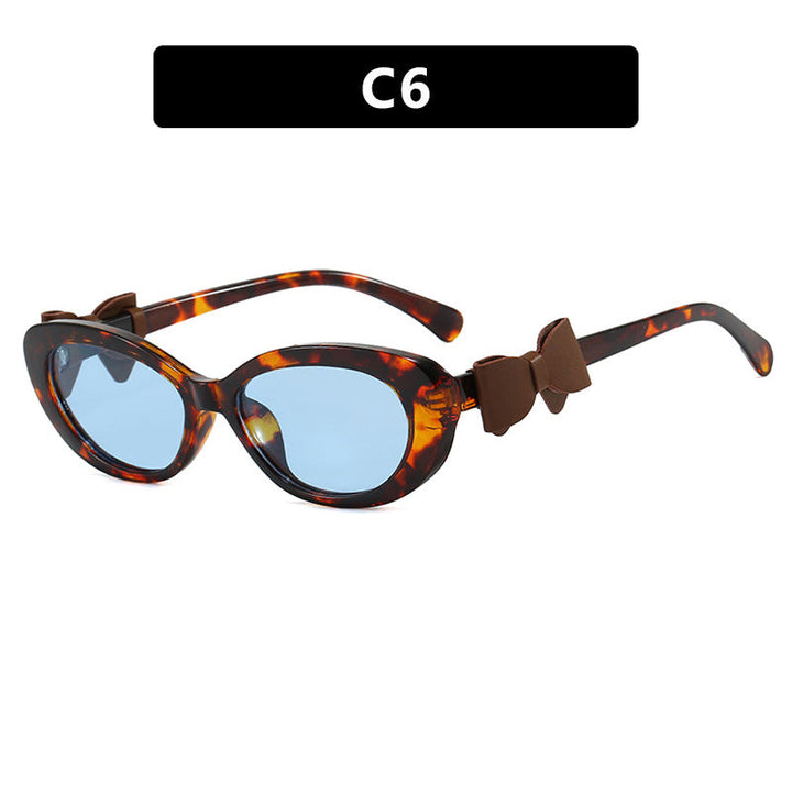 Women's fashionable sunglasses with playful bow design Kalsten