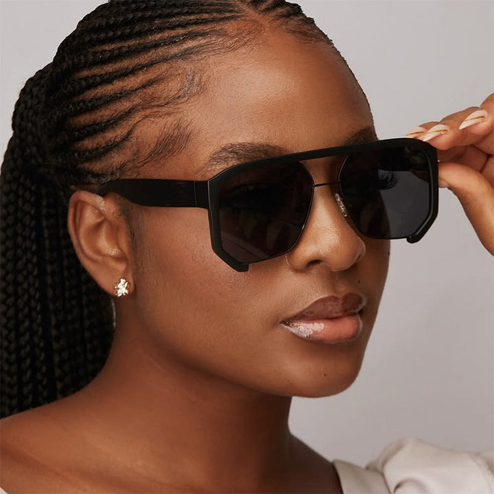 Ladies fashionable oversized sunglasses with elegant, faceted frame construction Kalsten