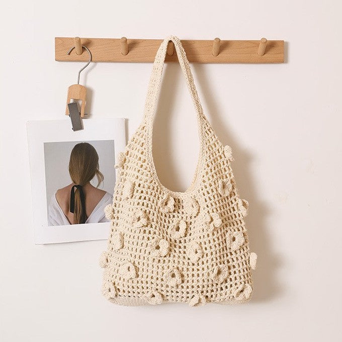 Hand-knotted shoulder bag with floral structural elements Kalsten