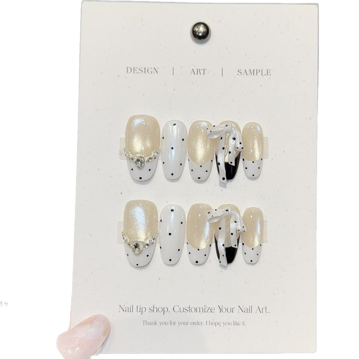 Artificial nails with glitter and bows Kalsten
