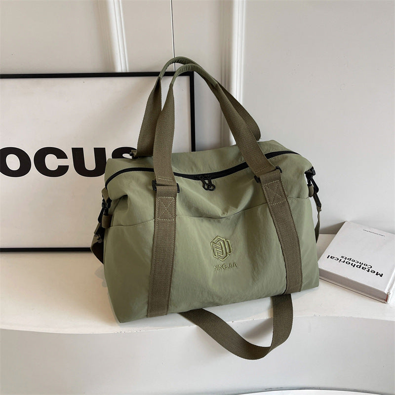 Sporty tote bag with multiple compartments and adjustable straps Kalsten