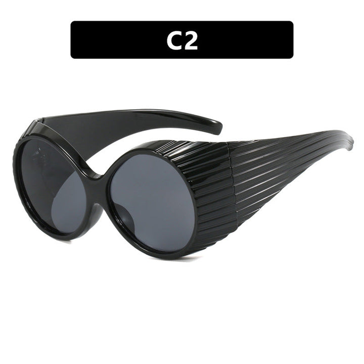 Women's extravagant sunglasses with curved frame Kalsten