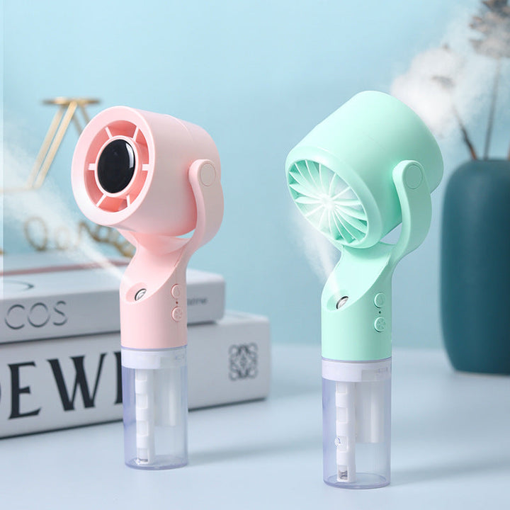 Cooling portable handheld misting fan with detachable water reservoir adjustable tilt and cute animal ears Kalsten
