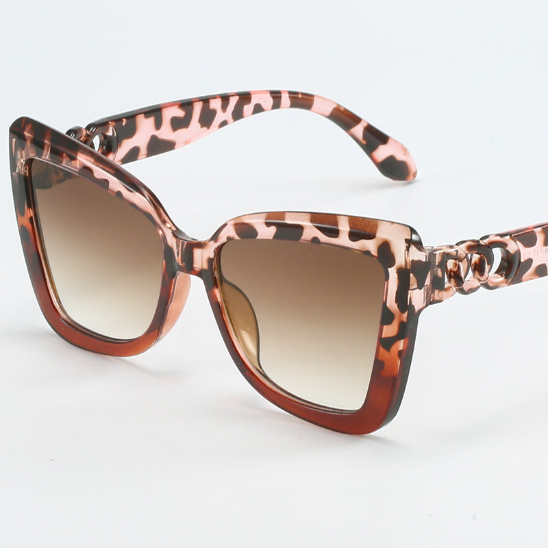 Ladies modern cat-eye sunglasses with clear frame and UV protection Kalsten