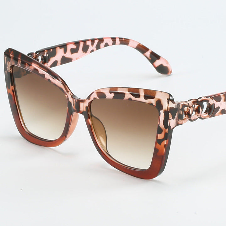 Ladies modern cat-eye sunglasses with clear frame and UV protection Kalsten