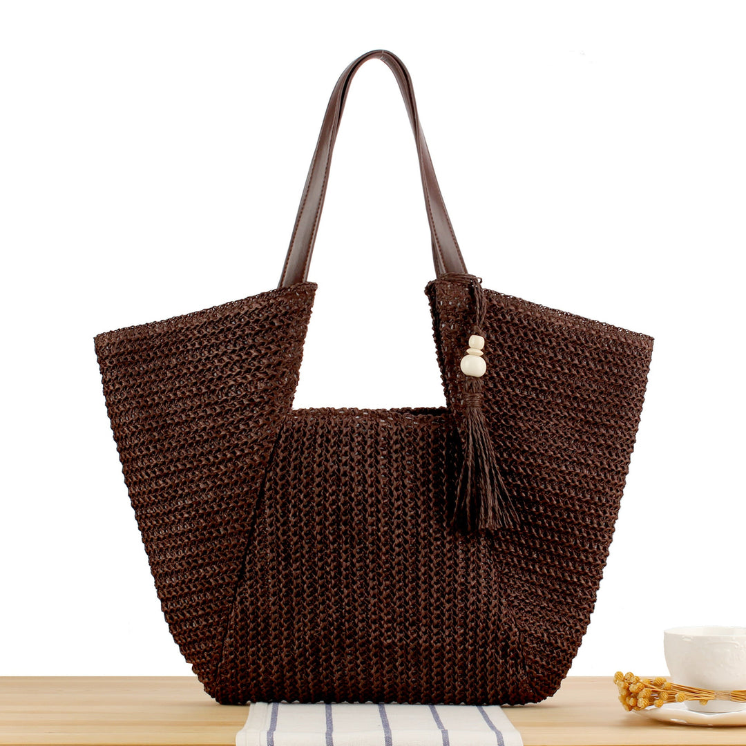 Handbag Made of Handwoven Raffia with Elegant Leather Accents Kalsten