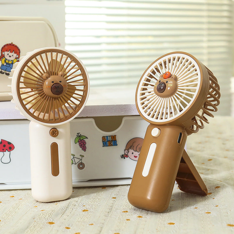 Unisex portable hand fan with bear motif and charging station Kalsten