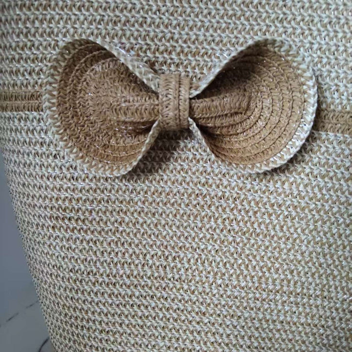 Elegant straw bag with decorative bow closure Kalsten
