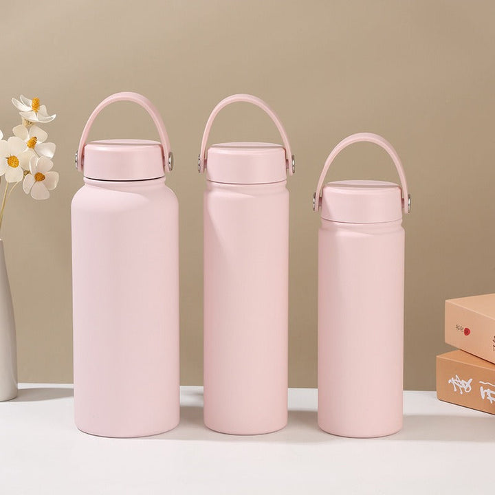 Women's double-walled insulated water bottle with practical carrying handle Kalsten