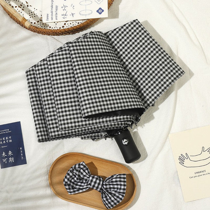 Ladies elegant folding umbrella with classic check pattern Kalsten