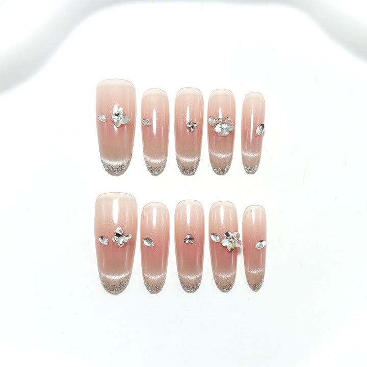 Glamorous artificial nails with rhinestone decorations Kalsten