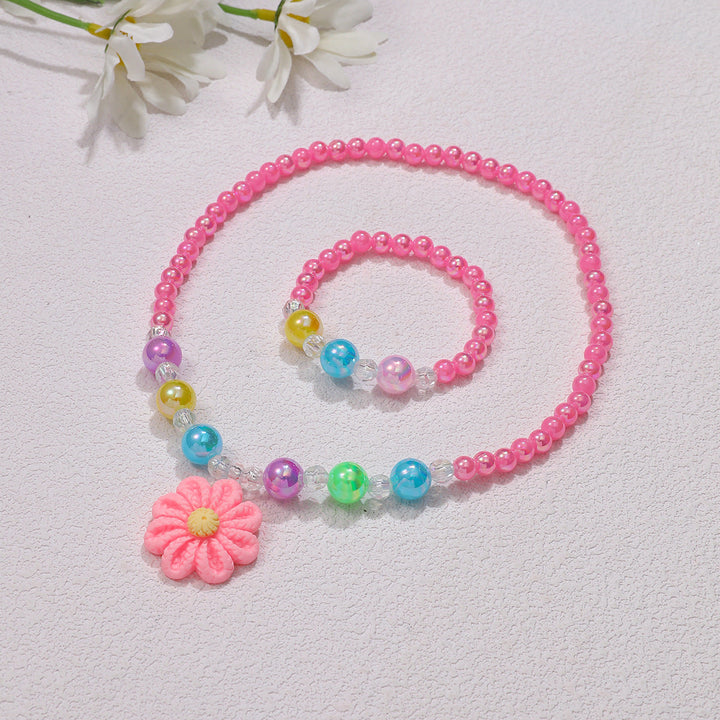 Playful jewelry set with flower pendant Kalsten