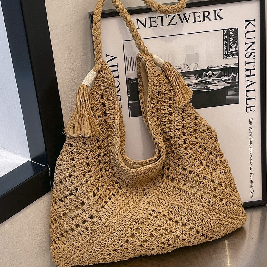 Hand-knotted shoulder bag with tassels and spacious interior Kalsten