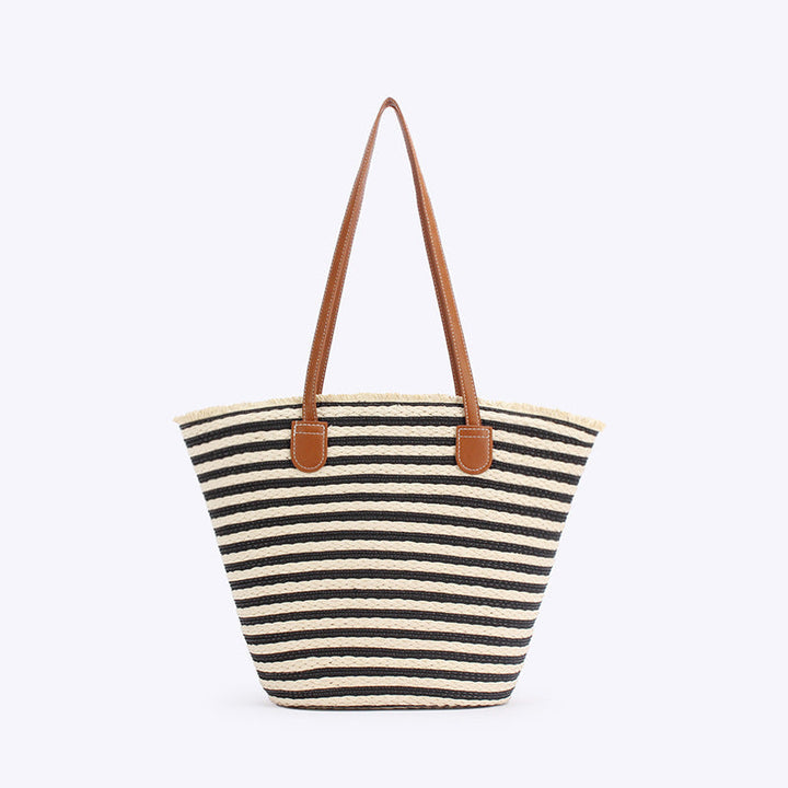 Generous beach bag with leather handles Kalsten
