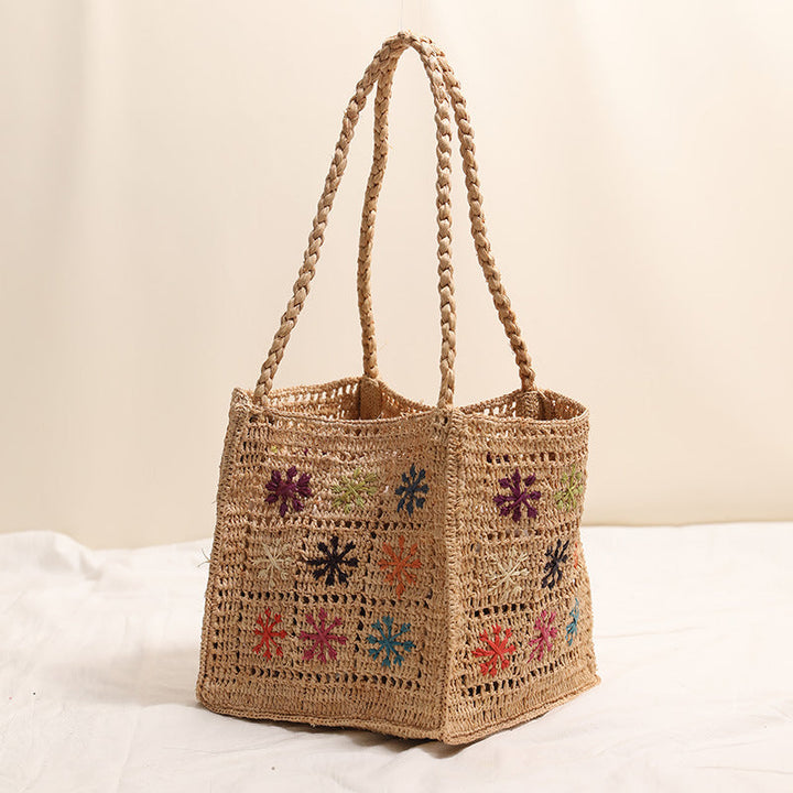 Handcrafted straw bag with colorful embroidery design Kalsten