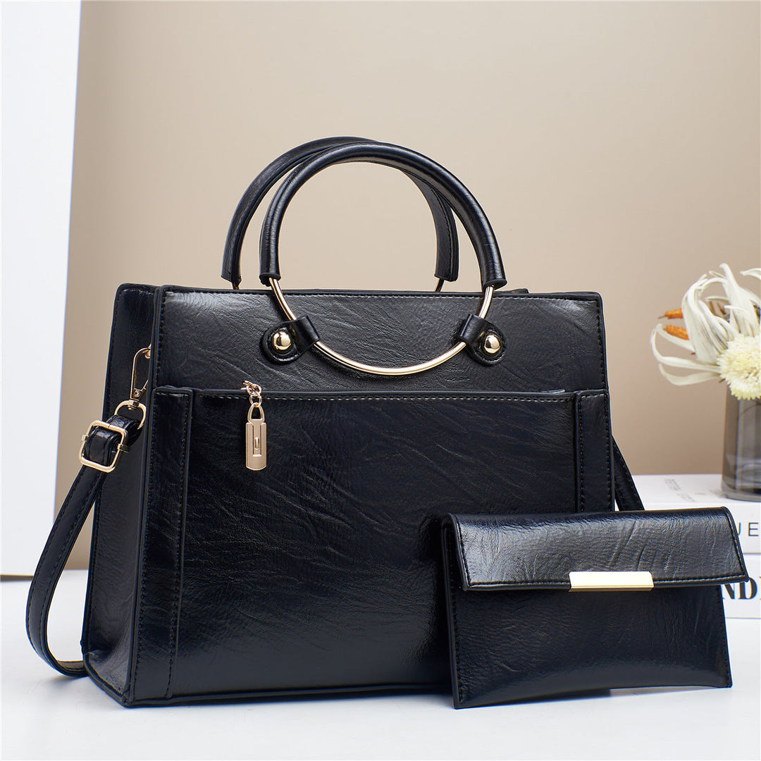 Elegant handbag with detachable shoulder strap and matching wallet Kalsten