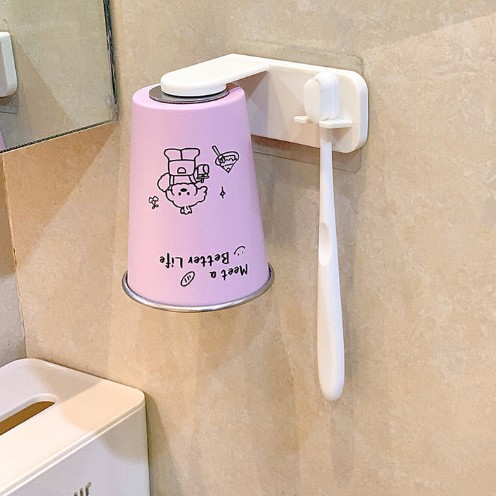 Wall-mounted toothbrush holder with playful design Kalsten