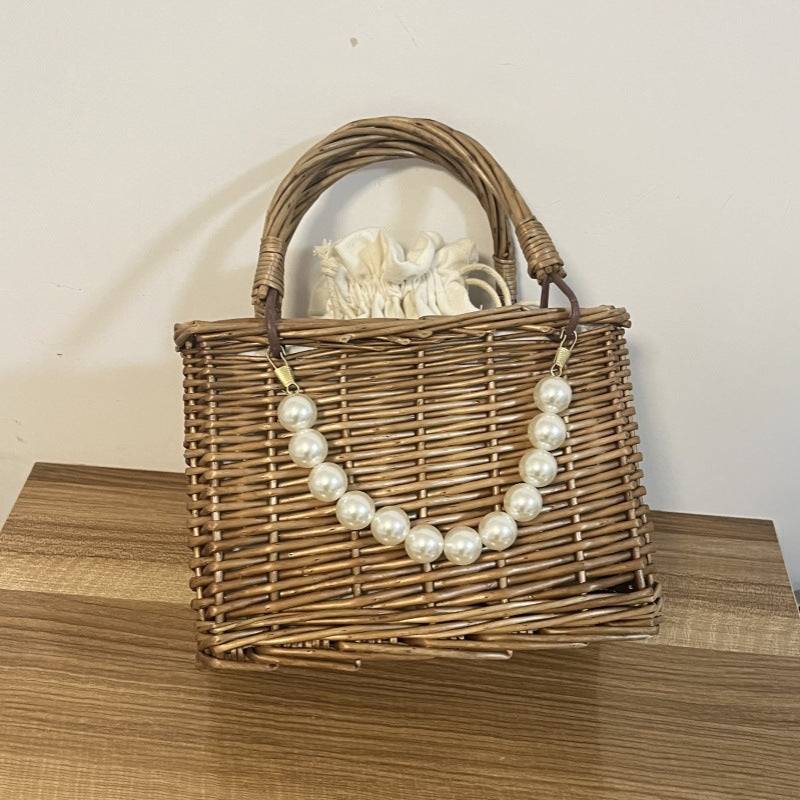 Ladies' basket bag with decorative pearl accents and bow decoration Kalsten