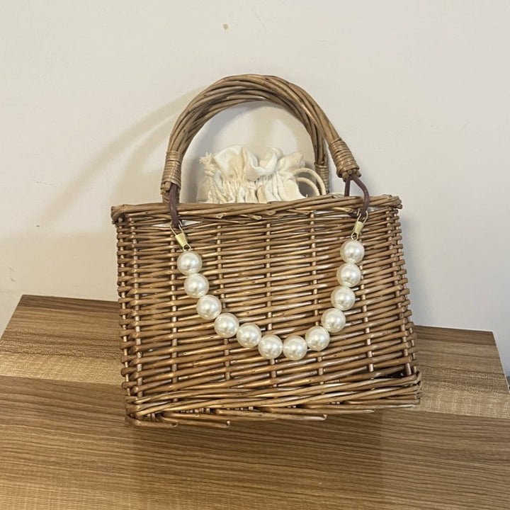 Ladies' basket bag with decorative pearl accents and bow decoration Kalsten
