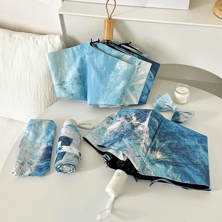 Ladies elegant folding umbrella with unique marble pattern Kalsten