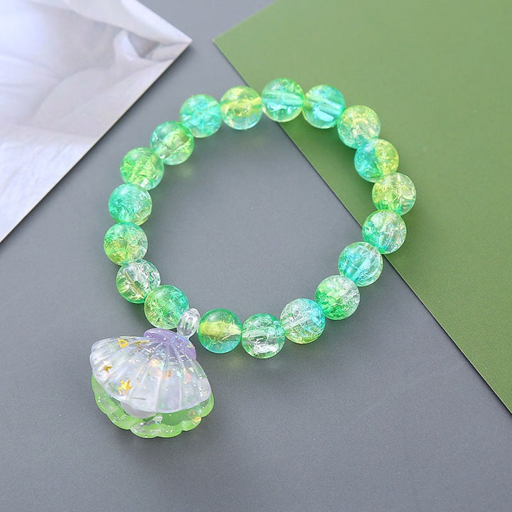 Playful bracelet with shell pendant Kalsten