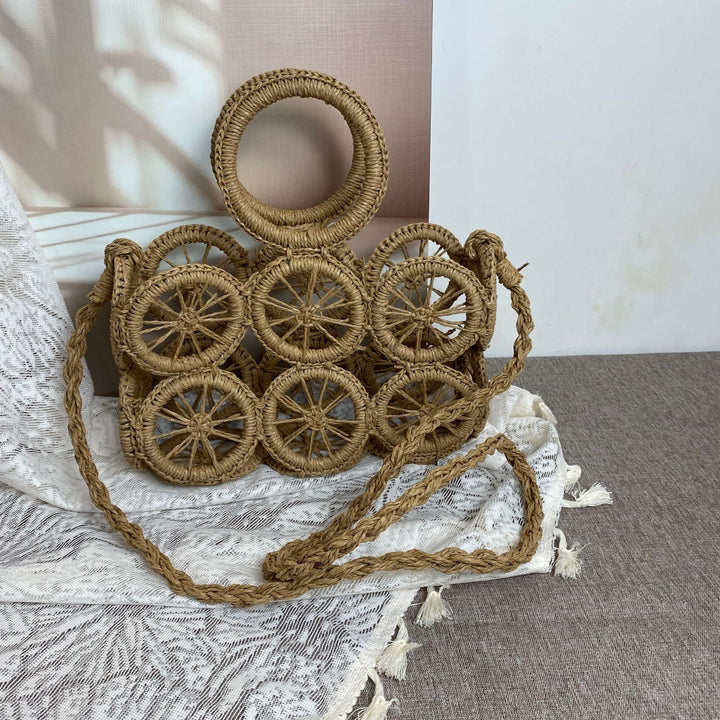 Artisan woven basket bag with striking wheel pattern Kalsten
