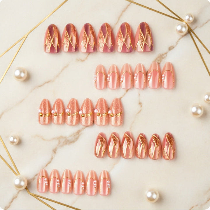 Artificial nails with elegant pearl and gold accents Kalsten