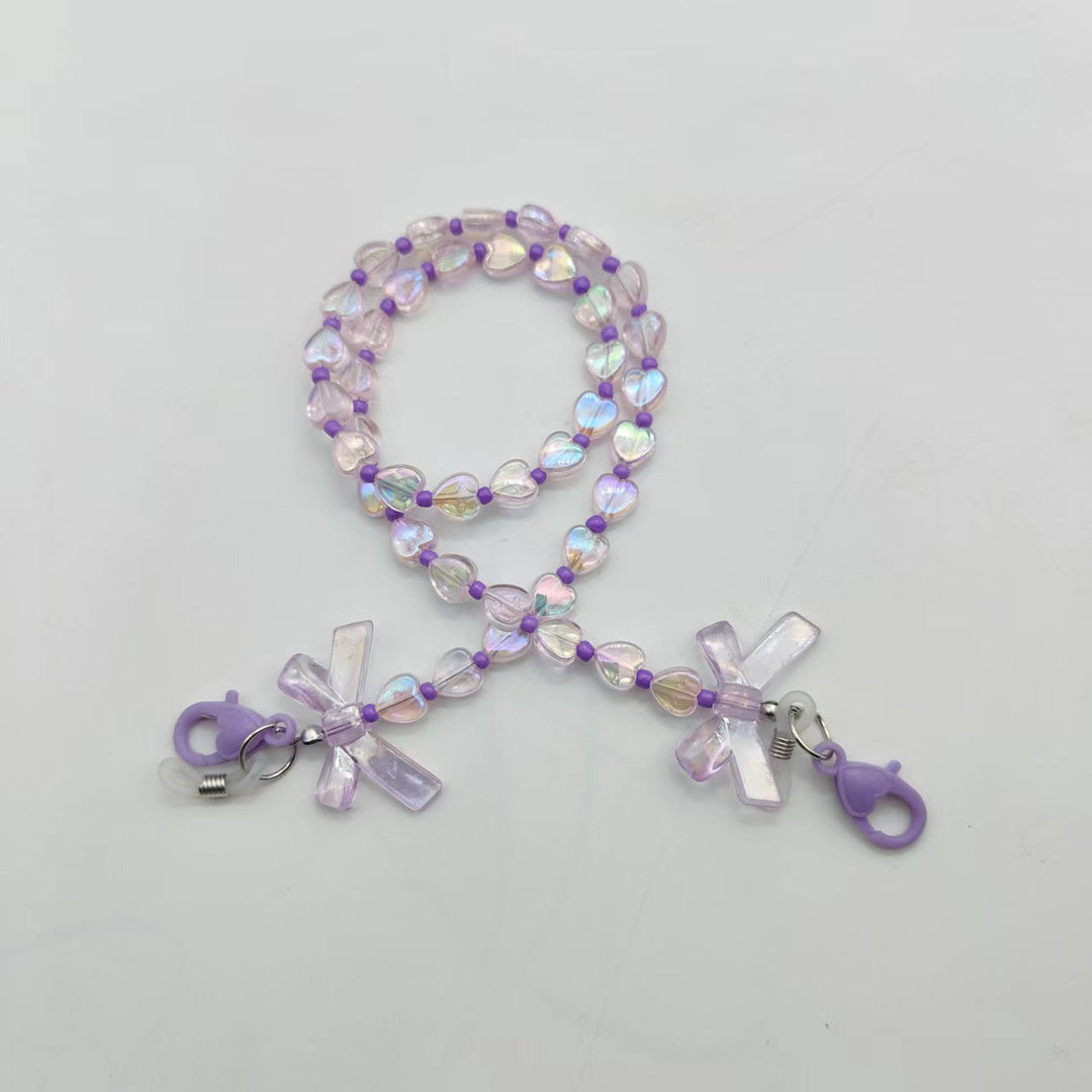 Fashionable glasses holder chain with heart and flower motifs Kalsten